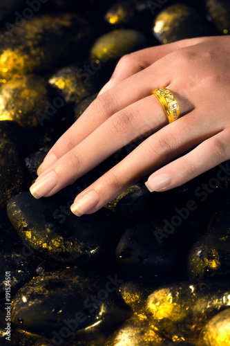hand wear beautiful golden ring