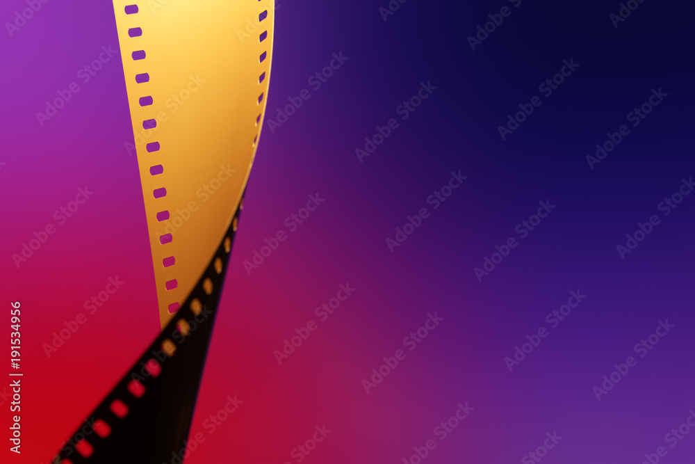 Camera negative film. Selective focus on film perforation. Unprocessed