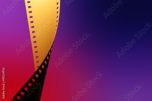 Camera negative film. Selective focus on film perforation. Unprocessed color motion picture film. Industry symbol for shooting process, photochemical laboratory process and film archive technology.