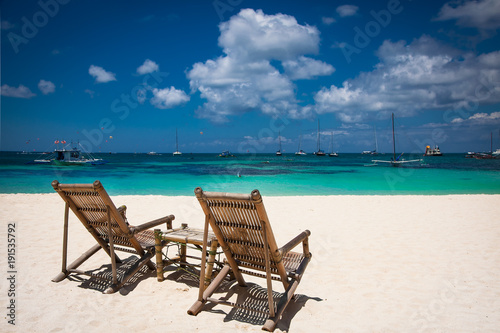 Tropical vacation on white sand beach with sun and blue sky at Boracay  Philippines.