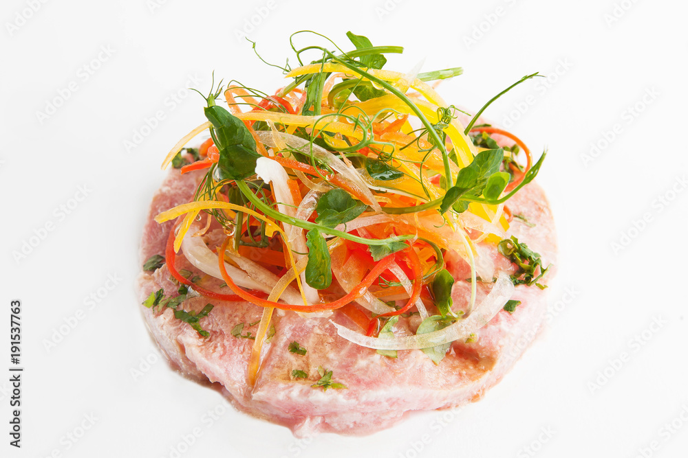 tartar with tuna and vegetables on a white background