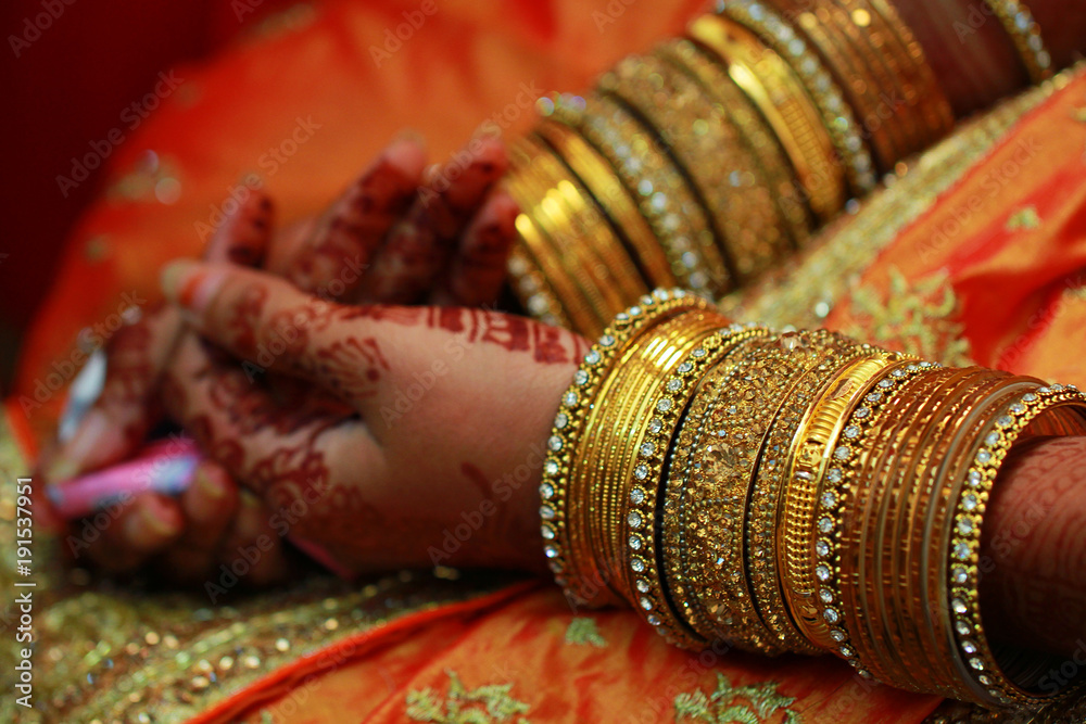 Indian wedding ceremony, closeup hand wedding jewelry, Indian bride,