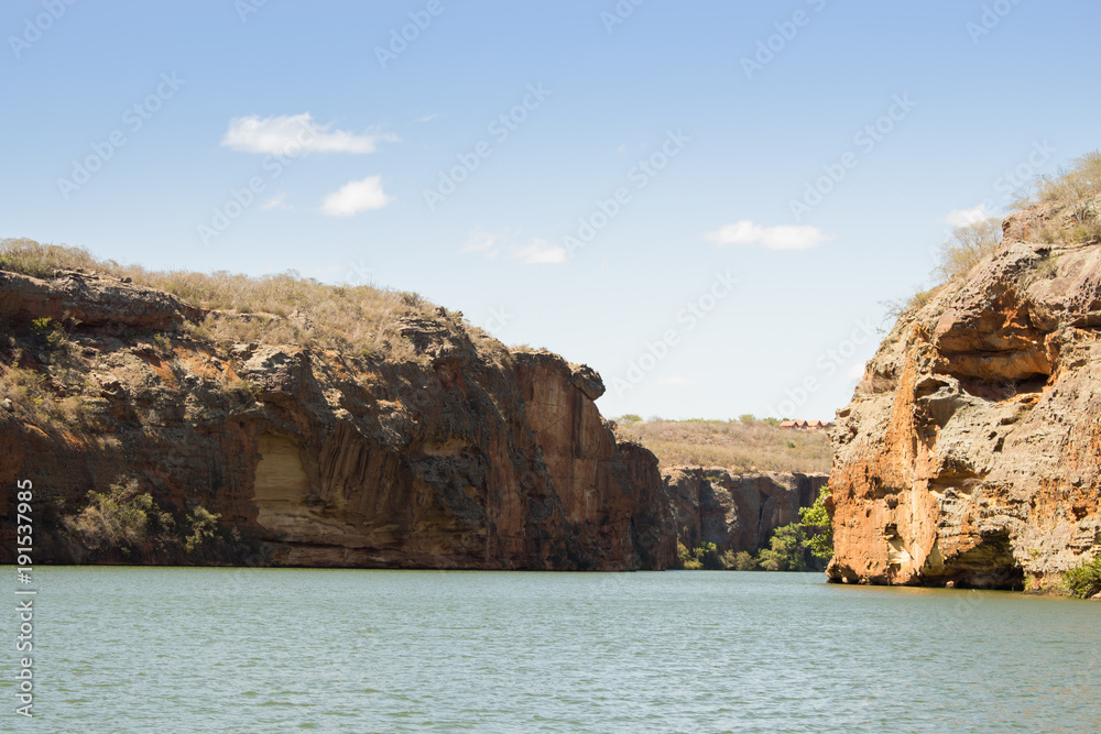 Sao Francisco River, one of the most importants river of Brazil, on the river have the production of energy, fish, tourism and drink water - showing blue sky and rocks a very beautiful place