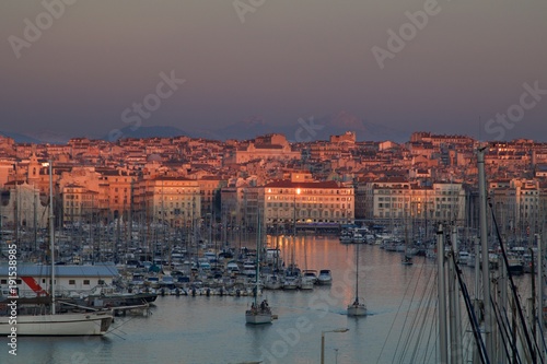 Old port in Marseille, France. Sailing boats in the sunset.