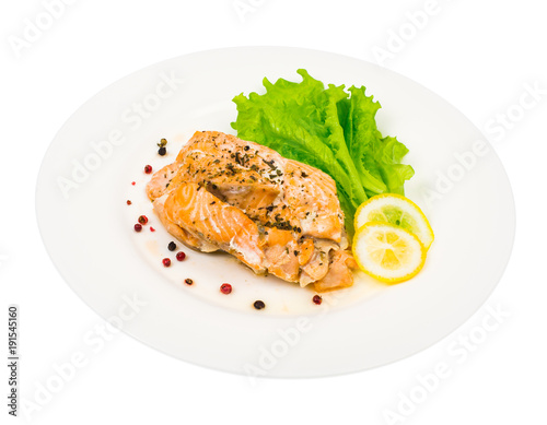 Dietary and healthy diet. Salmon steamed, lemon, green salad