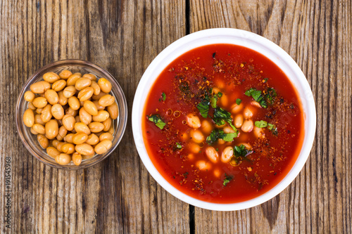 Canned white beans in tomato sauce. Spicy food