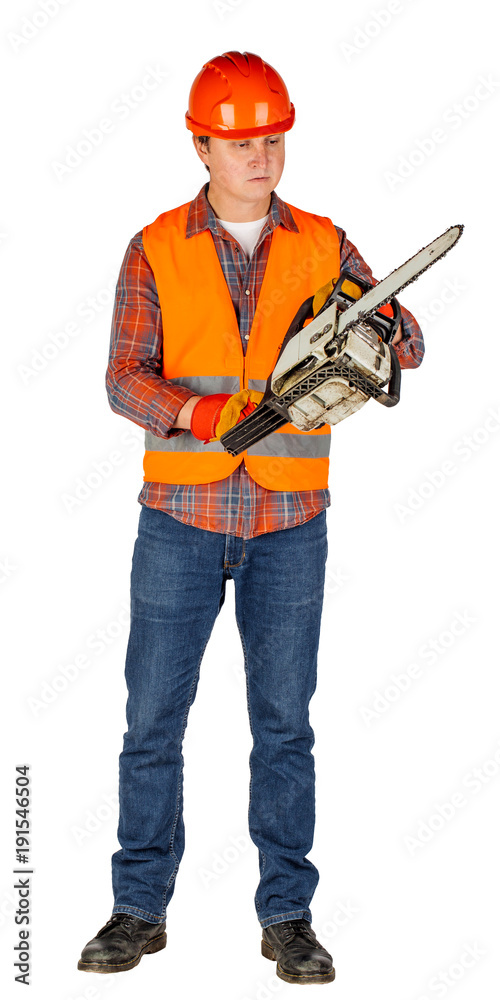 Full length portrait of a male builder in a orange helmet with chain saw over white wall background. repair, construction, building, people and maintenance concept.