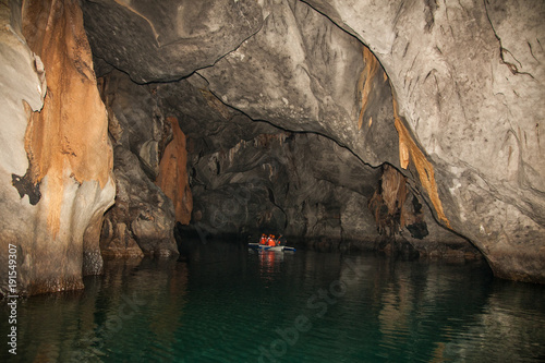 Boats at cave of Puerto Princesa subterranean underground river on Palawan, Philippines photo