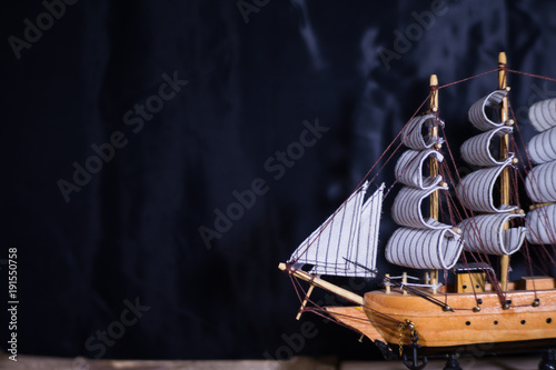 souvenir ship on a black background