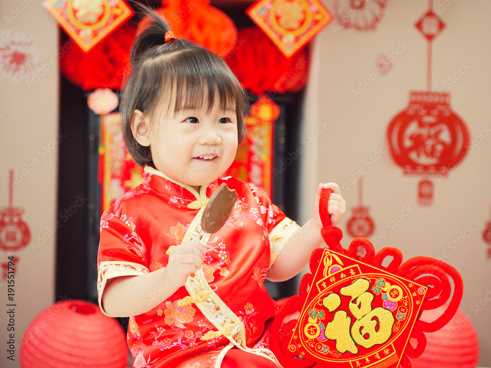 Chinese baby girl with traditional dressing up and Chinese baby girl with traditional dressing up and