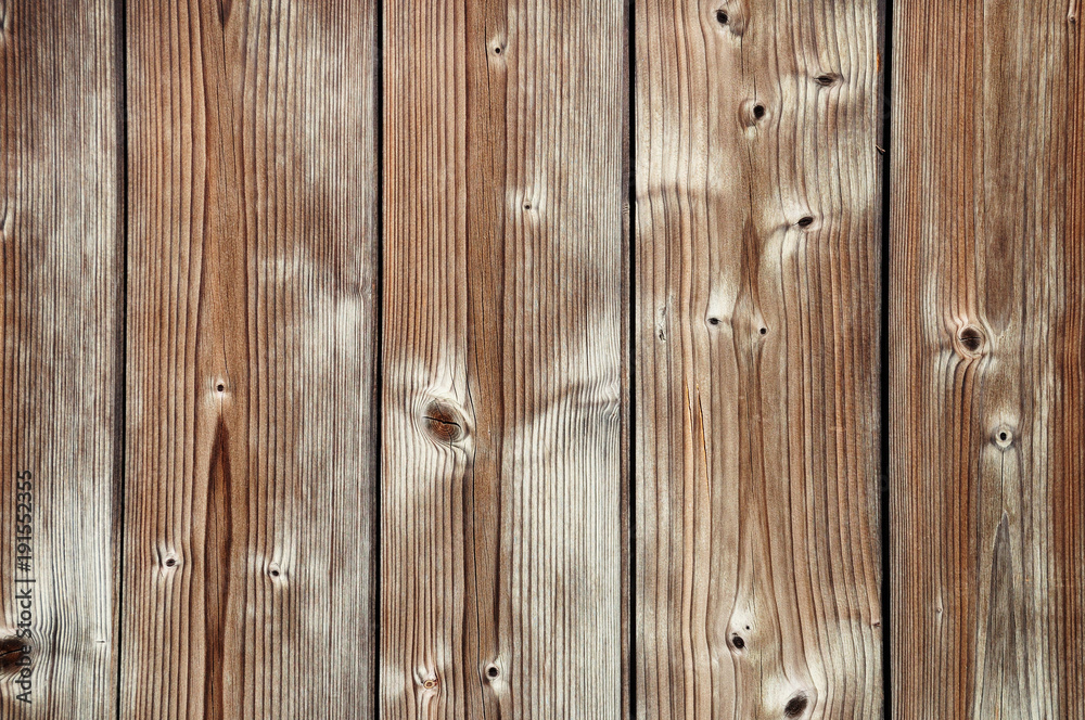 Naklejka premium Fragment of weathered wooden fence