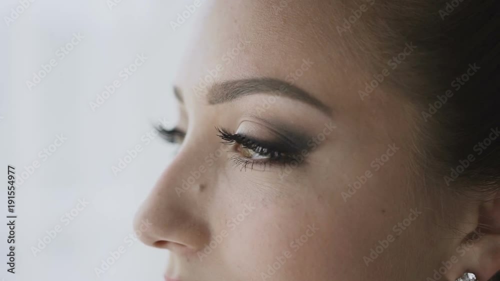 Close-up face of a beautiful girl with a beautiful make-up Close-up face of a beautiful girl with a beautiful make-up