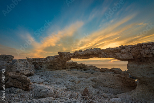 Natural arch of Portinatx at sunset, Ibiza, Spain