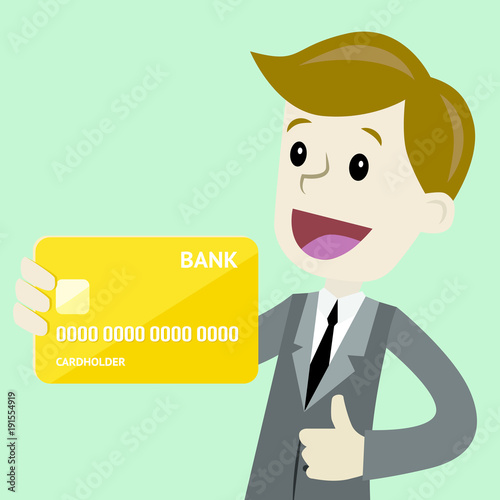 Businessman holds credit card in his hand and has profit. Succsessful business. Payments photo