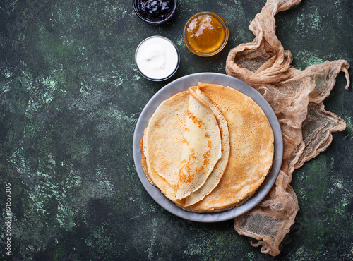 Pancakes crepes with different jam and cream