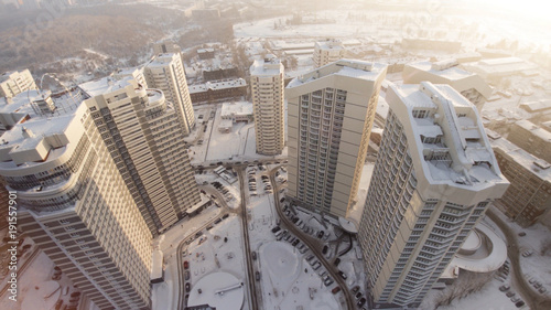 Complex of new apartment residential houses with balconies. Clip. Top view of the luxury residential complex at sunset photo