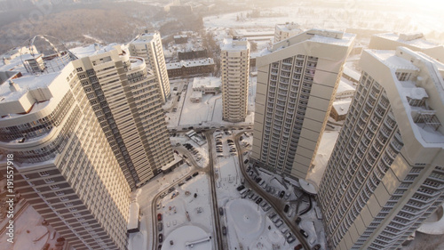 Complex of new apartment residential houses with balconies. Clip. Top view of the luxury residential complex at sunset photo