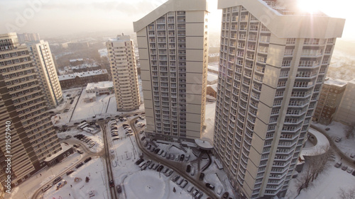 Complex of new apartment residential houses with balconies. Clip. Top view of the luxury residential complex at sunset photo