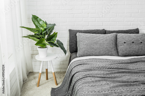 interior bedroom decor gray white flower photo