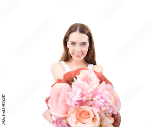 Wallpaper Mural  Beautiful fresh young caucasian woman smiling showing pink flowers in hands isolated on white background. Torontodigital.ca