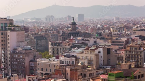 BARCELONA, CATALONIA, SPAIN Timelapse city centre old buildings rooftop photo