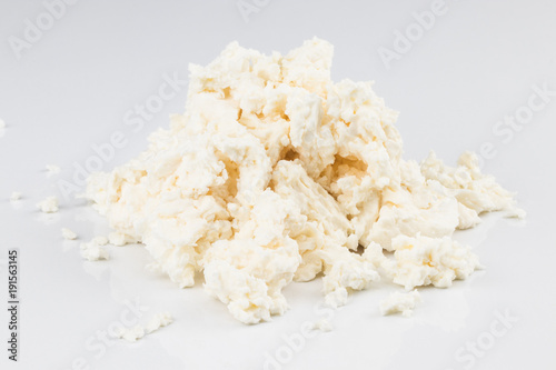 Cottage cheese (curd) heap, isolated on white