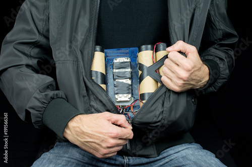 terrorist hides a bomb on his body, make bomb concept