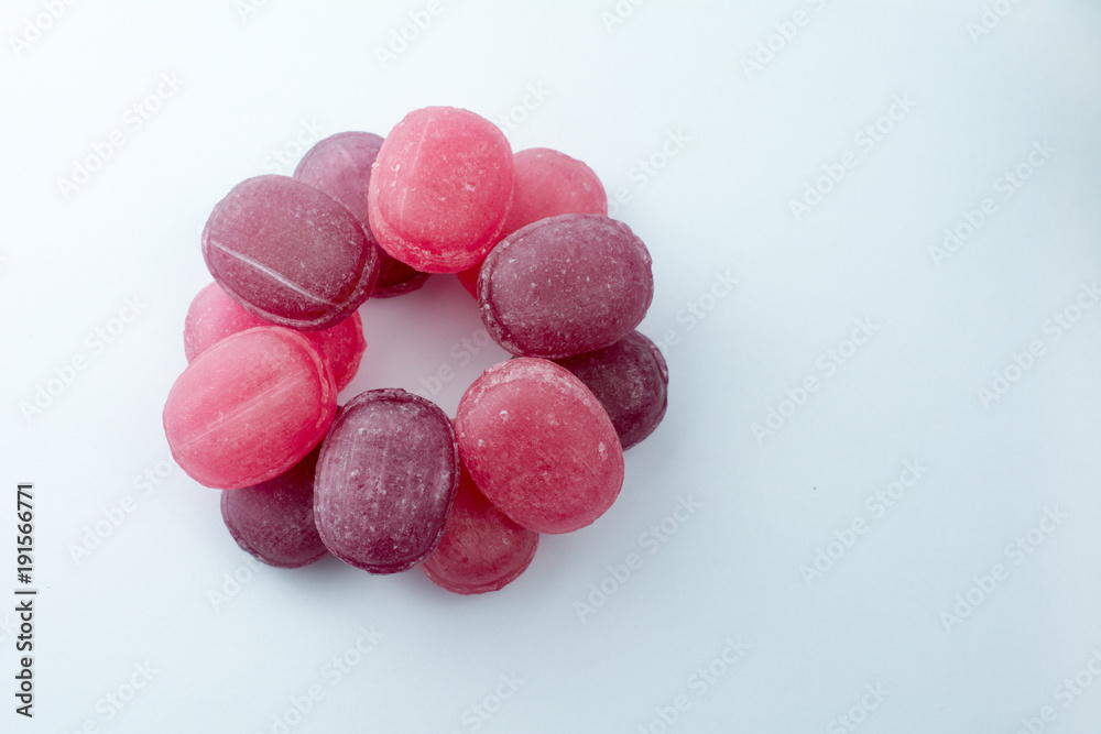 red lollipops white background selective focus closeup red lollipops white background selective focus closeup
