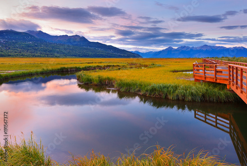 Beautiful sunrise at Potter Marsh Wildlife Viewing Boardwalk, Anchorage, Alaska. Potter Marsh is located at the southern end of the Anchorage Coastal Wildlife Refuge. photo