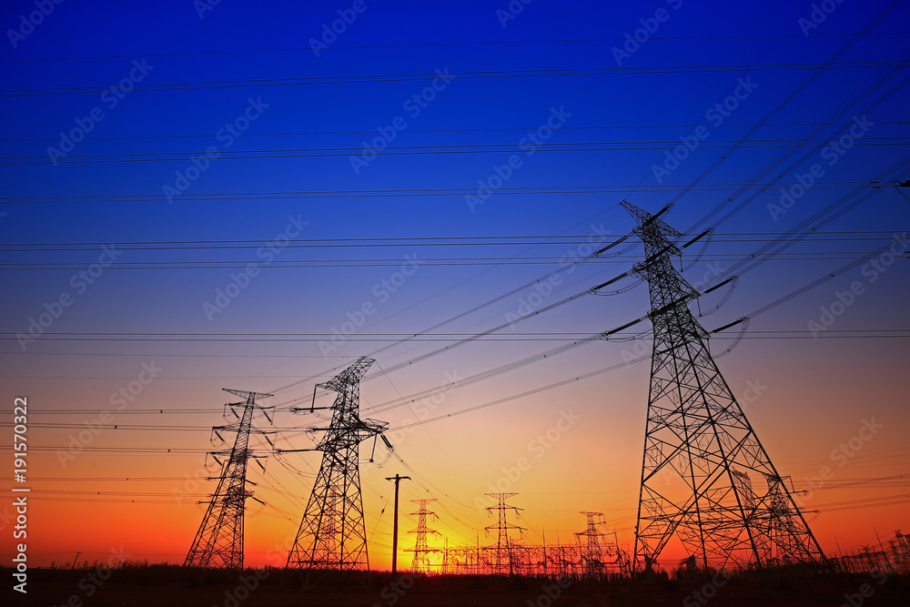 Sunset silhouette of pylon