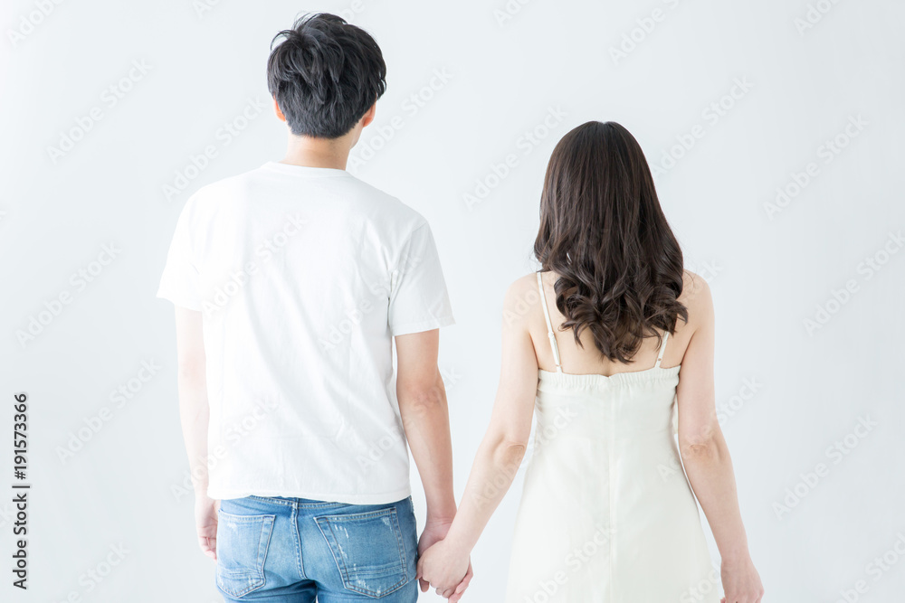 手をつなぐカップルの後ろ姿 Stock Photo Adobe Stock