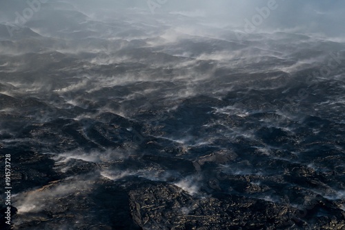 Aerial view of steaming lava field © Elizabeth