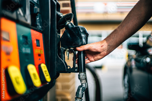 Gas Station Pump With Hand photo