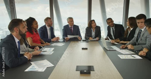 4K Cheerful financial business team in boardroom meeting discussing ideas & offering opinions