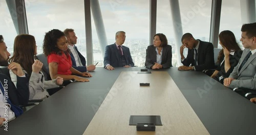 4K Large business team arguing about a business failure in boardroom meeting