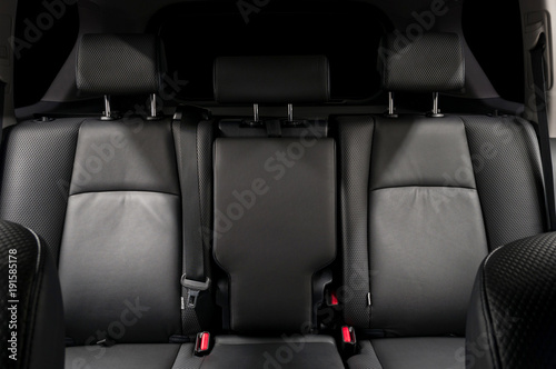 Back passenger leather seats. Luxury car interior detail.
