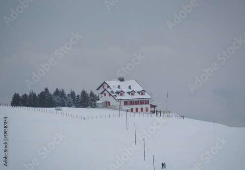 Landscape to the Magnolini lodge at Monte Pora ski area in winter season. Orobie Alps