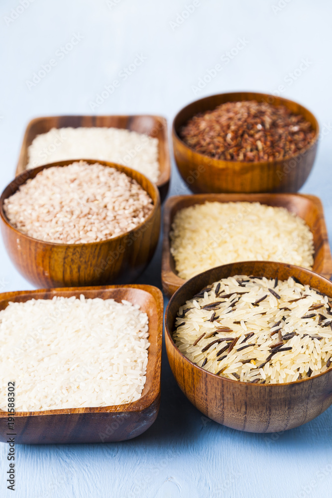 Six bowls with different varieties of rice Six bowls with different varieties of rice