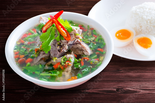 Spicy Pork with Pork bone Soup with Rice and Egg.