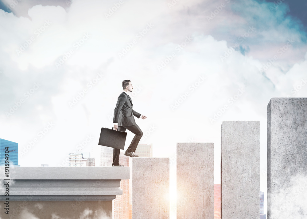Businessman and a huge graph in a city Businessman and a huge graph in a city