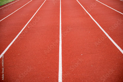 red running track for background. © Hide_Studio