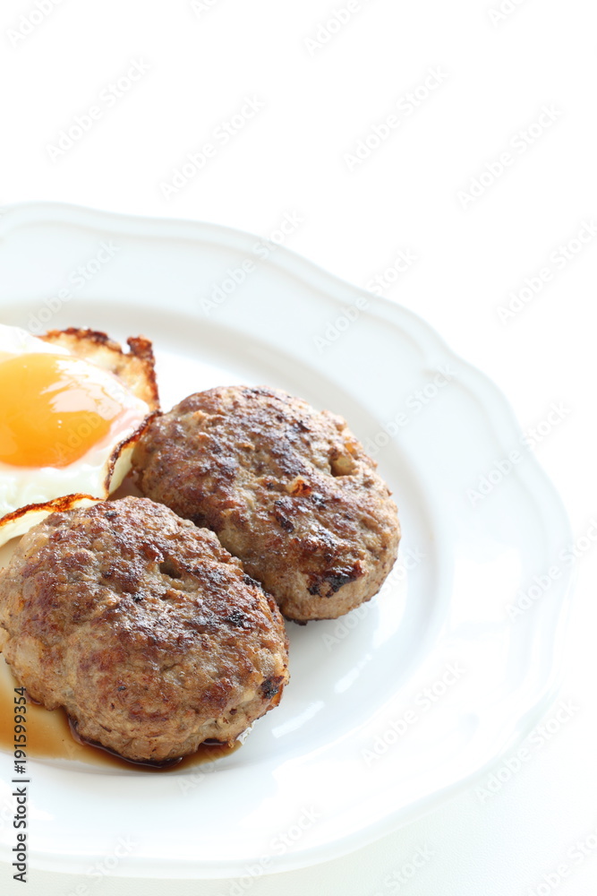 homemade patty and sunny side up fried egg homemade patty and sunny side up fried egg