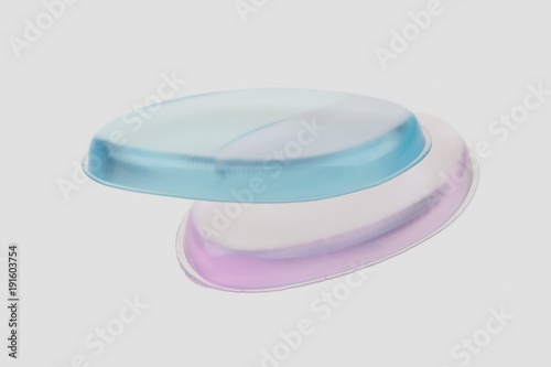 Two silicone sponge pink and blue natural spa on a gray background