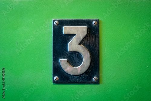 number 3 sign - number three metal sign on green background