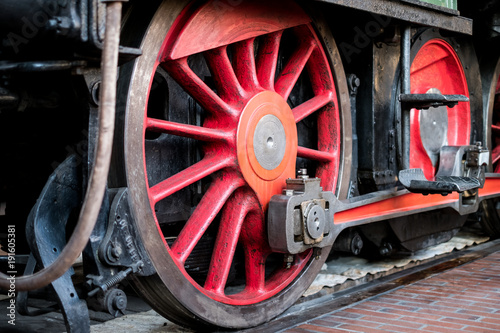 old steam locomotive wheel closeup - old transport technology