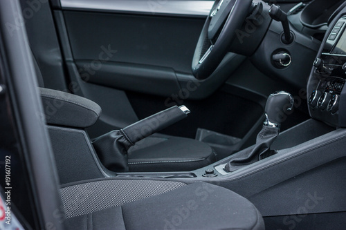 car interior with handbrake and gearstick