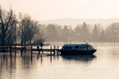 Riverboat on a calm sunny wintermorning photo