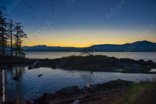 View of Nanaimo bay and skyline at dusk, taken from Jack Point in Nanaimo, British Columbia.