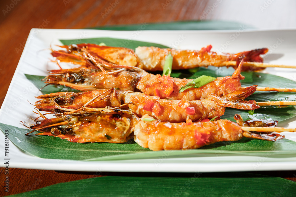 Fried hot big size shrimps on sticks Fried hot big size shrimps on sticks