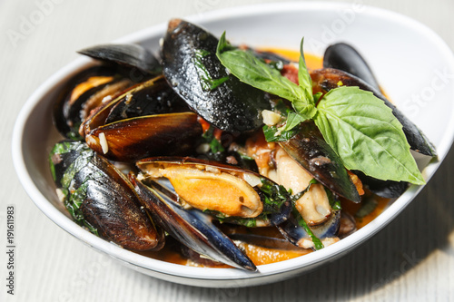 Plate with mussels in a hot perrer sause